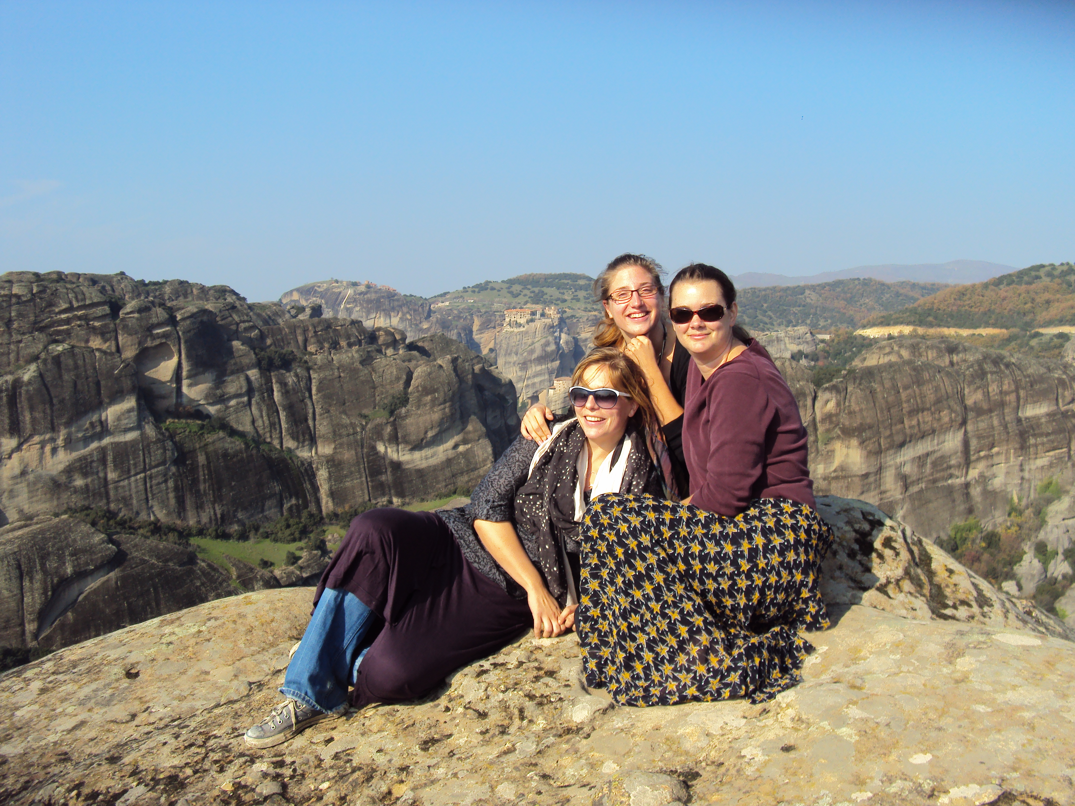 girls on mountain top in meteora greece