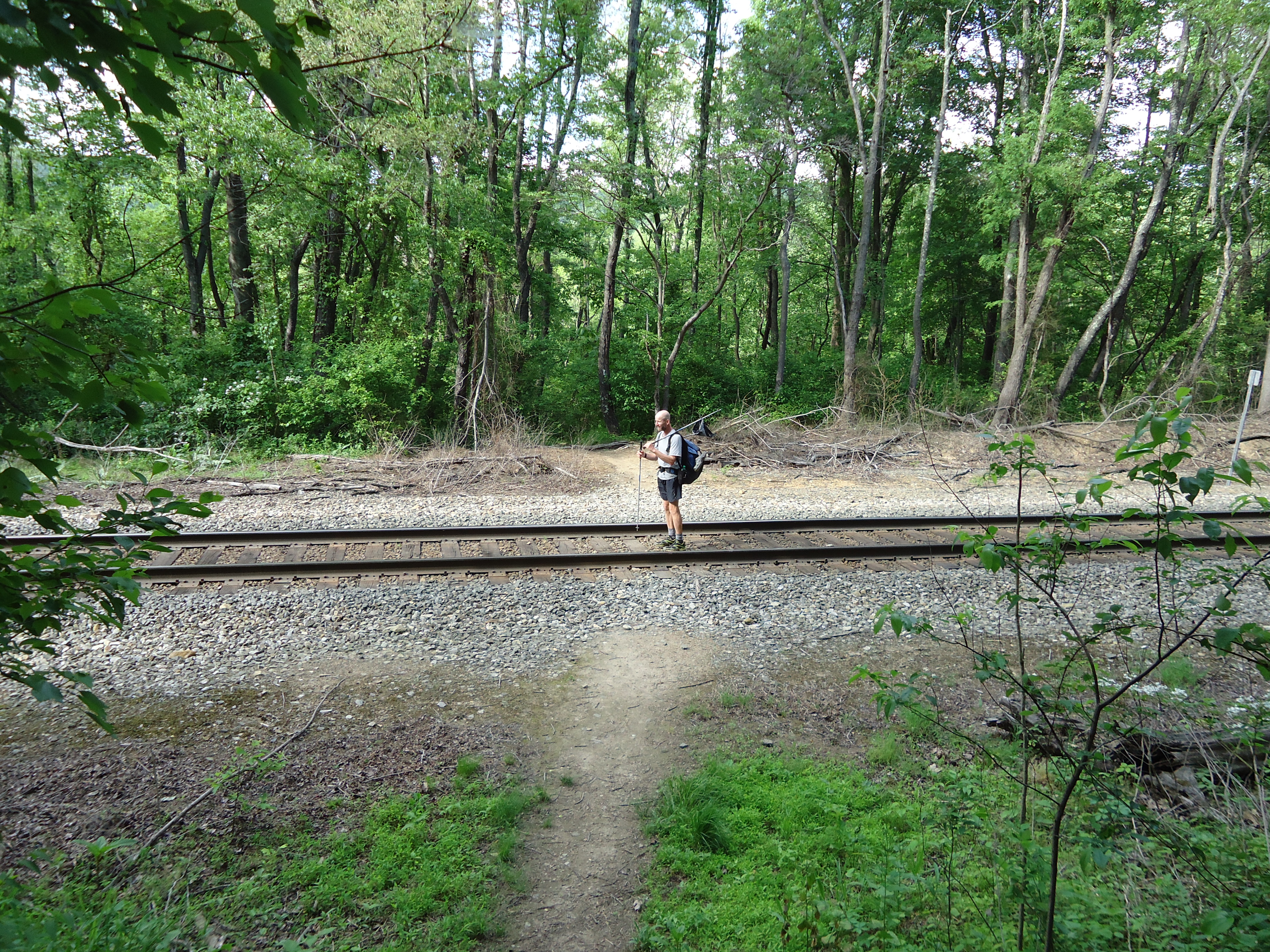 Hiker standing on railroad tracks appalachian trail virginia