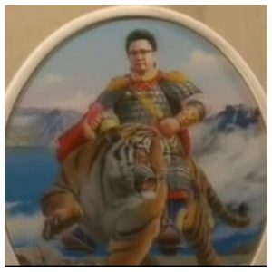 Kim Jung Il riding a tiger wearing armor